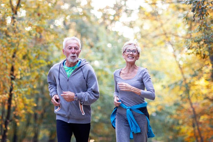 Run Further programme photo - a man and a woman jogging